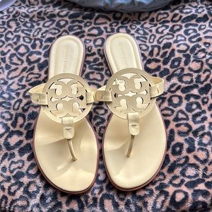 Size 10 yellow Tory Burch. Never worn
